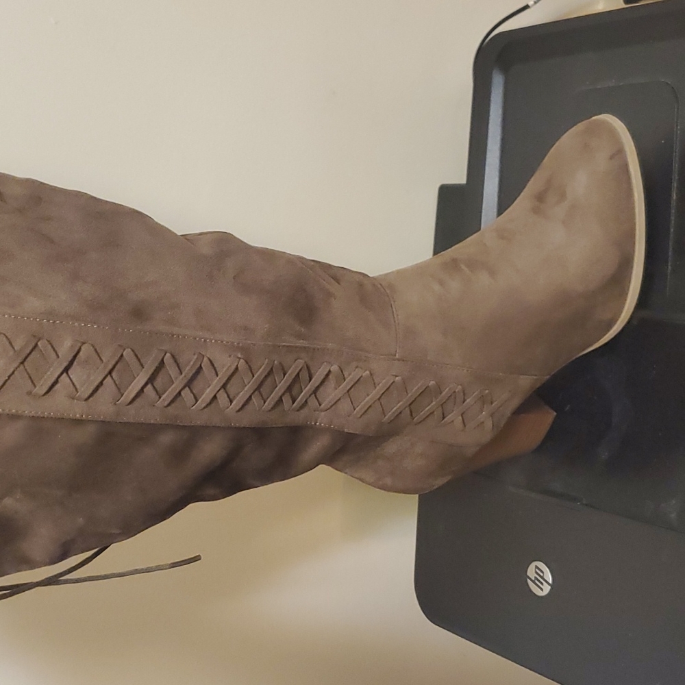 Womens size 12 over the knee wide calf boot. Never worn.